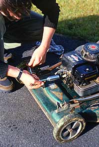 In Fall, remove your mower's spark plug and pour an ounce of oil into the cylinder. 