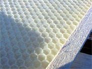 Comb foundation is made of beeswax, or a combination of plastic and beeswax.